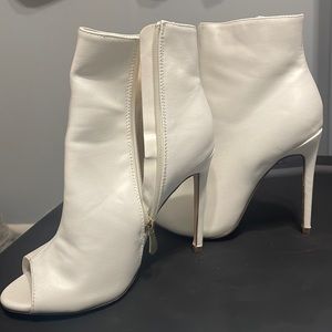 Ankle high open toe stiletto high heel